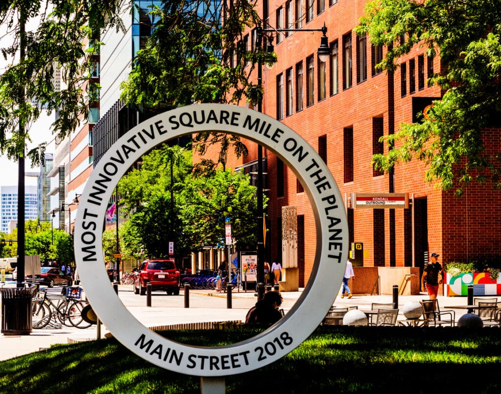 Kendall Square monument in Cambridge, MA reading "Most innovative Square Mile on the Planet. Main Street 2018"