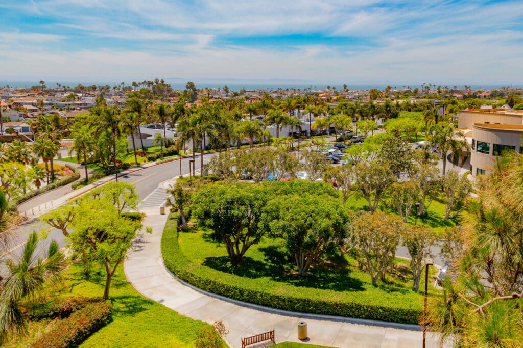 Overview of Newport Beach with palms trees near Costa Mesa, CA 