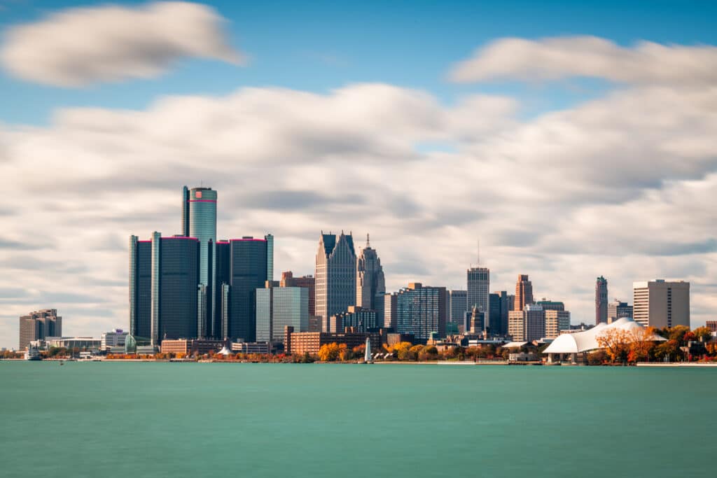 Detroit, Michigan, USA downtown city skyline on the Detroit River.