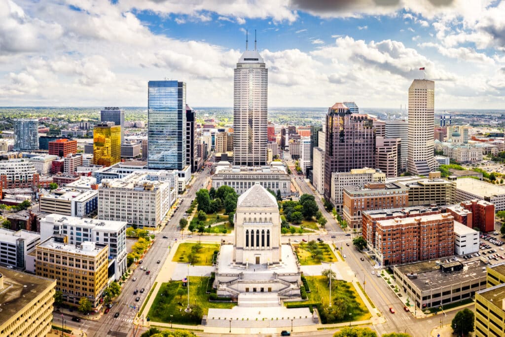 Aerial view of Indianapolis, Indiana skyline above Indiana World War Memorial and University park, and along Meridian and Pennsylvania streets.