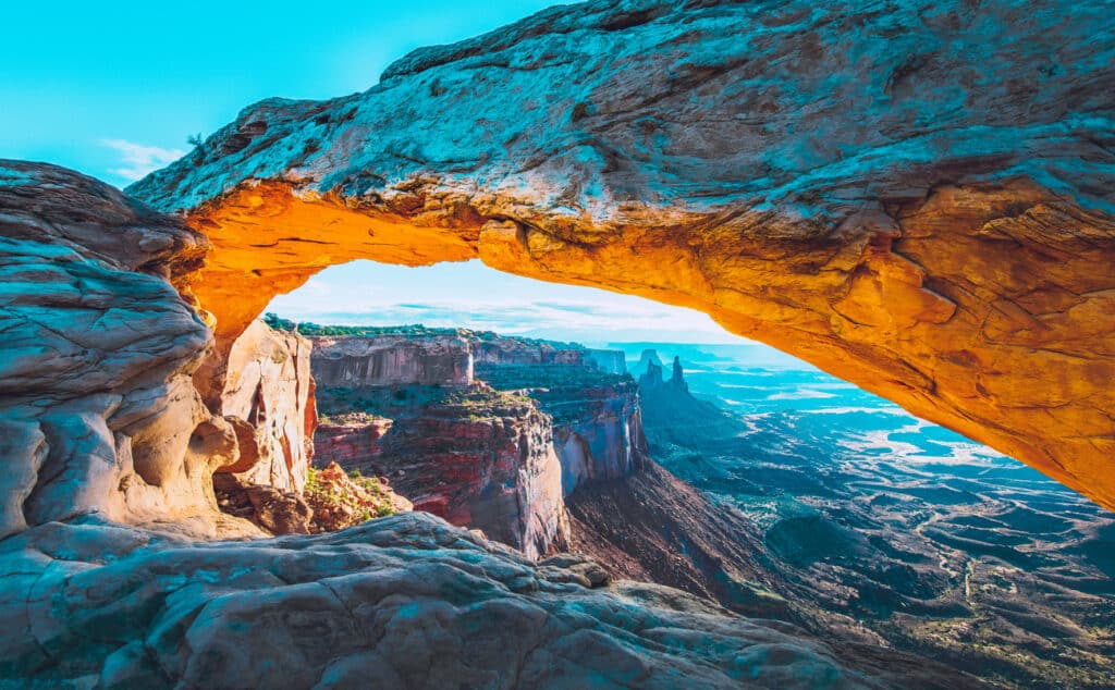 The sunrise at the Mesa Arch in the Canyonlands National Park makes the arch glow, Utah, USA.