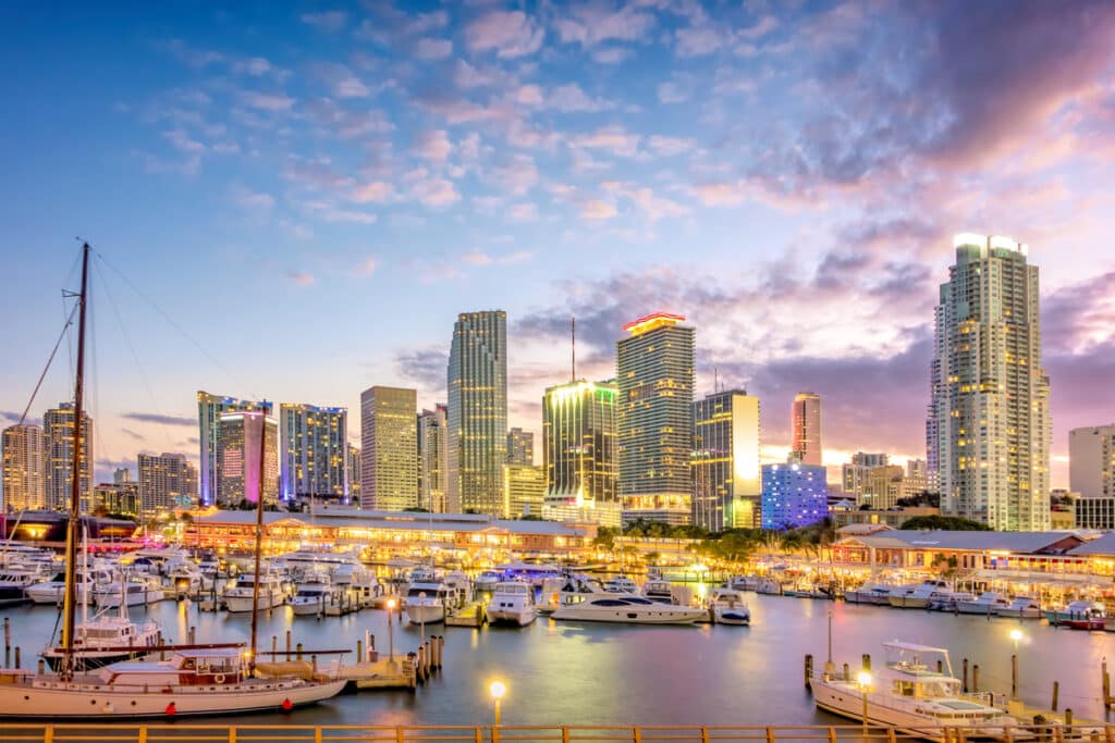 Miami Skyline Harbor Florida at sunset with boats in view