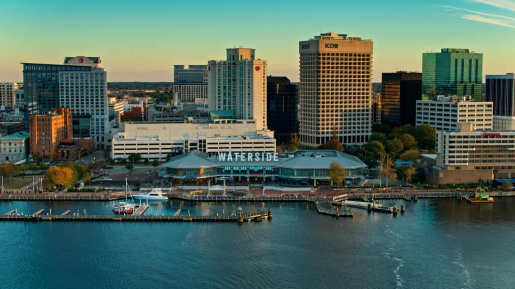 Aerial shot of Downtown Norfolk, Virginia from over the Elizabeth River on a sunny morning.